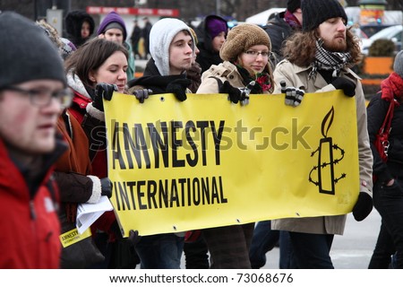 WARSAW, POLAND - MARCH 6: Amnesty International during feminist demonstration in Warsaw, on March 6, 2011 in Warsaw, Poland.