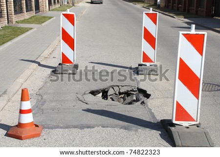 Dangerous hole in the road