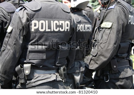 WARSAW, POLAND - JUNE 30:  Closeup of a police cordon protecting government buildings during anti government Solidarity demonstration on June 30, 2011 in Warsaw, Poland.