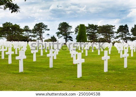 NORMANDY AMERICAN CEMETERY, COLLEVILLE-SUR-MER, FRANCE - AUGUST 23: View to the American Memorial cemetery in Normandy on August 23, 2014. It honours American troops who died during World War 2.