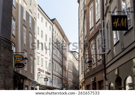 SALZBURG, AUSTRIA - SEPTEMBER 26: View to the shoppers street Getreidegasse, which, one of the oldest streets in Salzburg on September 26, 2009. Salzburg is the capital of federal state of Salzburg.