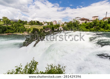 RHEINFALLS, SWITZERLAND - MAY 17: View to the biggest waterfalls of Europe in Schaffhausen, Switzerland on May 17, 2015. They are 150 m (450 ft) wide and 23 m (75 ft) high.