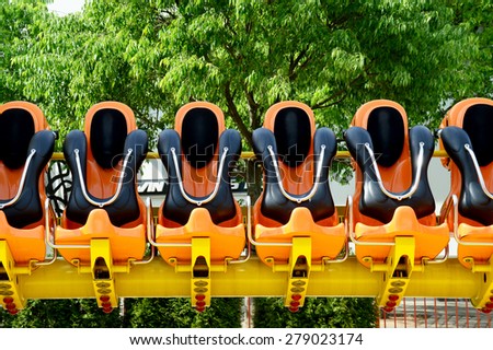 Safety Seats with Metal Brackets of a Fairground Ride
