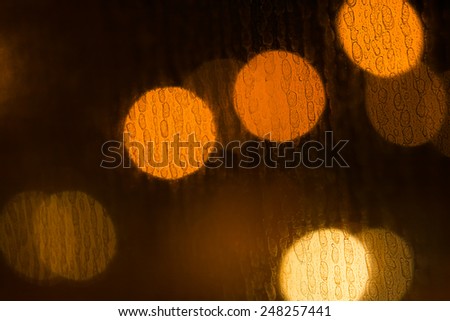 Abstract defocused colorful blurred and Bokeh background through the Looking Glass