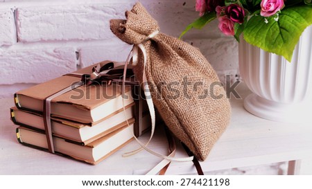 Photo of the interior of the gift books with a bag lying on the shelf