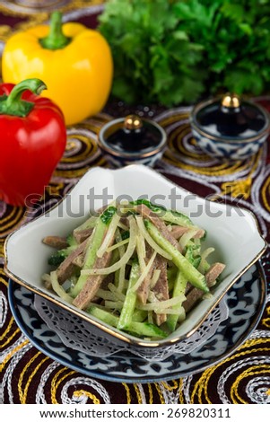 Salad with Cucumbers, boiled beef tongue, onion, mustard dijon