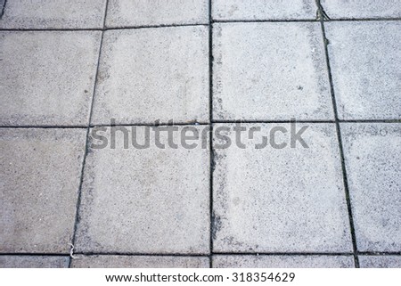 Concrete slabbed pavement surface.