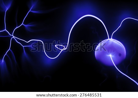 Plasma globa, Plasma globe, blue plasma lights in dark background.