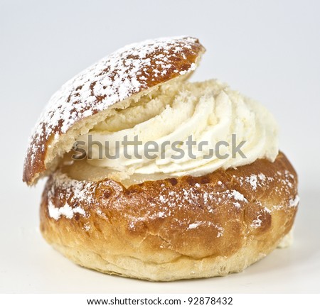 Single cream bun with almond paste, cream and vanilla powder
