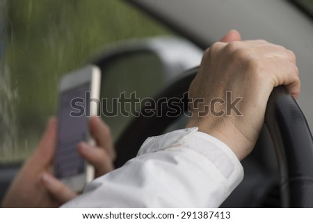 Reading text message while driving a car