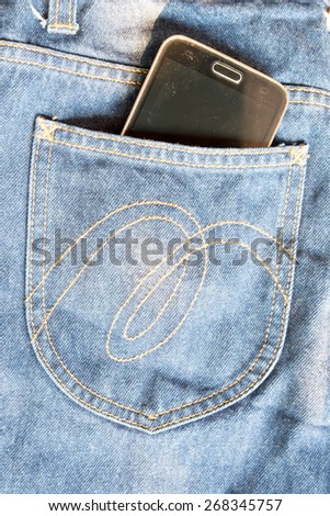 blue jeans pocket with phone