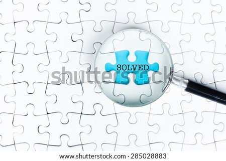 Missing puzzle searching with magnifying glass with 