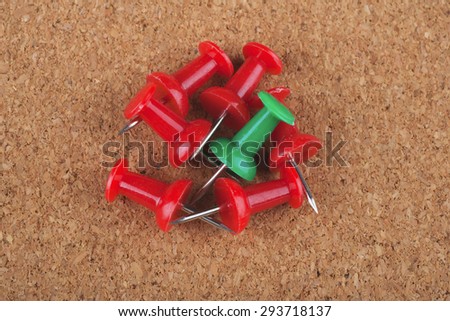 Green Push Pin On Crowd Red Push Pins on board background, Leadership Concept