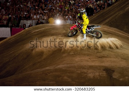 POZNAN, POLAND - AUGUST 6: A professional rider at the FMX (Freestyle Motocross) competition at Red Bull X-Fighters 2011.