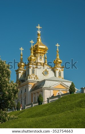 PETERHOF,SAINT-PETERSBURG,RUSSIA-JUNE 5, 2015: Palace Church of the Holy Apostles Peter and Paul in Peterhof, Saint-Petersburg, Russia