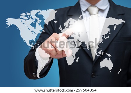 Businessman standing posture hand pushing social network structure isolated on over blue background