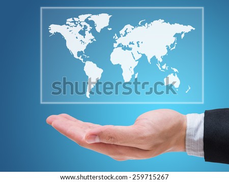 Businessman hand holding globe map isolated on blue background