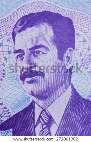 Old Iraq money, macro of Saddam Hussein.   Close up of the detail in the old bank note from Iraq.
