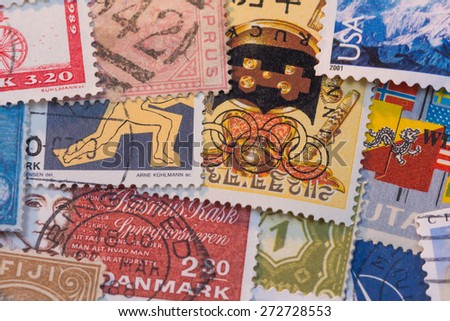 Stamp collage abstract background.  Stamps that have been postmarked from all over the world.