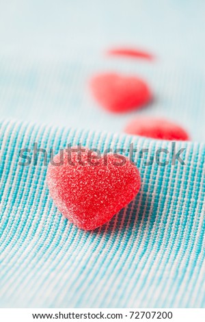 Heart shape candy for Valentine\'s day on a light blue background