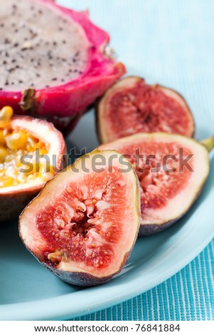 Tropical fruit plate of Figs, Pitahaya and passion fruit.