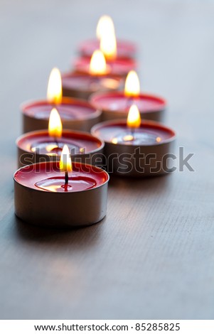 Close-up of red tea-light candles for Christmas