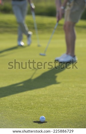 putt goes in the hole / even though you\'re frustrated / this makes you come back