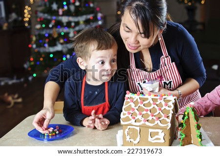 very happy dude / checking out the gingerbread / as the young kids do