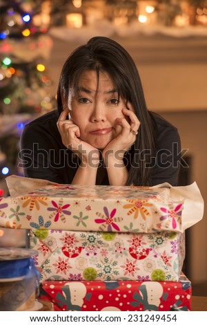 frazzled woman's gifts / looks like they are for christmas / judging by decor
