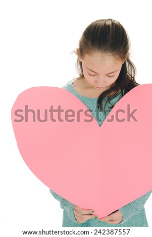 small girl with large heart / with plenty of copyspace / and it\'s really pink