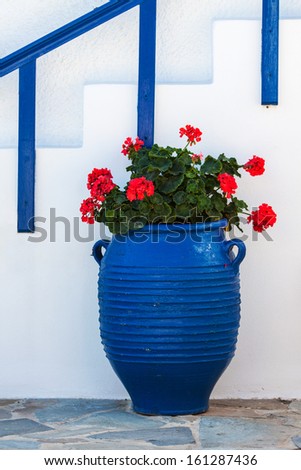 traditional Greek Vase with old door in Santorini,