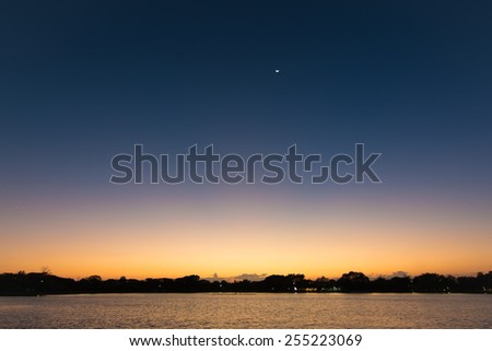 Dawn twilight sky on the river