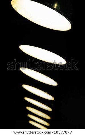 Hanging inverted lamps in a straight line