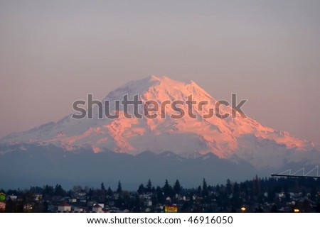 Mount Rainier towering over township houses in the Port of Tacoma  Washington