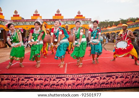 BHUBANESWAR, INDIA - DECEMBER 20: Tribal dancers perform at the Toshali National Crafts fair on December 20, 2011 in Bhubaneswar, Orissa, India. Toshali is the largest art and crafts fair in India.