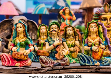 Beautiful clay dolls of miniature folk musicians performing in a band of classical Indian music