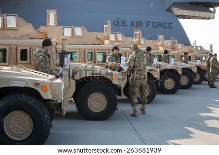 KIEV, UKRAINE - MARCH, 25, 2015:U.S. Air Force plane with the first lot of American armored vehicles arrived in Boryspil International Airport