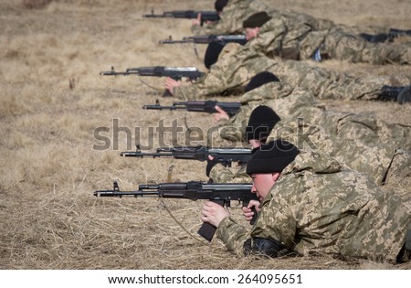 ZHYTOMYR REGION, UKRAINE - MARCH, 27, 2015: Mobilized soldiers take part in military training and combat exercises