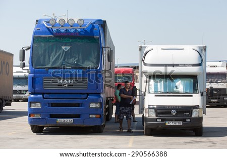 MARTUSIVKA, UKRAINE - JUNE, 25, 2015: Trucks in the territory of custom post \