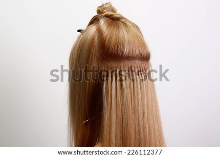 woman\'s head in progress of making a hair set on white background