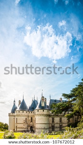 Ancient castle with fairy tale towers, blue sky with clouds in background. Chateau de Chaumont, Loire Valley Castles, France, Europe.