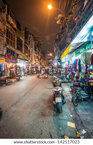 HANOI, VIETNAM - NOVEMBER 30: Street life at night. It is capital of Vietnam and country\'s second largest city. Hanoi will host the 2019 Asian Games. November 30, 2012, Hanoi, Vietnam, Asia.