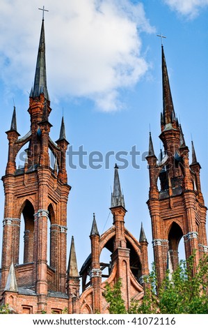 fairy tale, castle like catholic church with blue sky in background