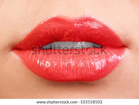 Female lips close up. Red color