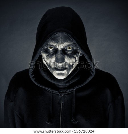 The man in an image of the monster on a black background The man in an image of the monster on a black background