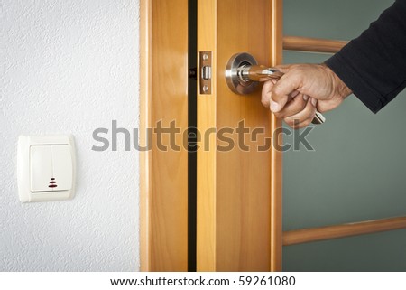 The person opens an interroom door