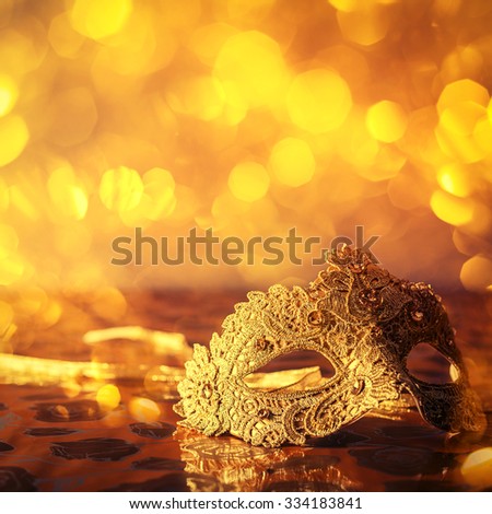 carnival mask on a golden background
