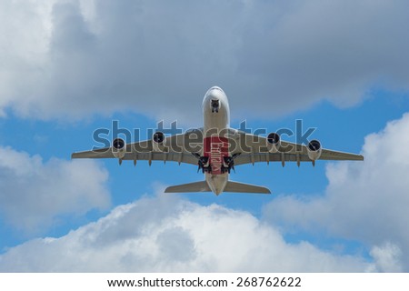 MANCHESTER, UNITED KINGDOM - APRIL 11, 2015: Airbus A380 Emirates just taken off from Manchester airport on April 11, 2015.