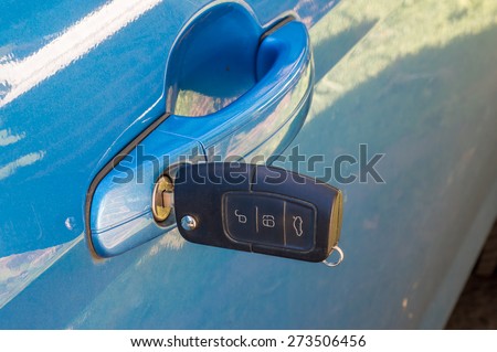 Car key in the door lock