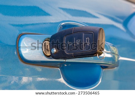 Car key in the door lock